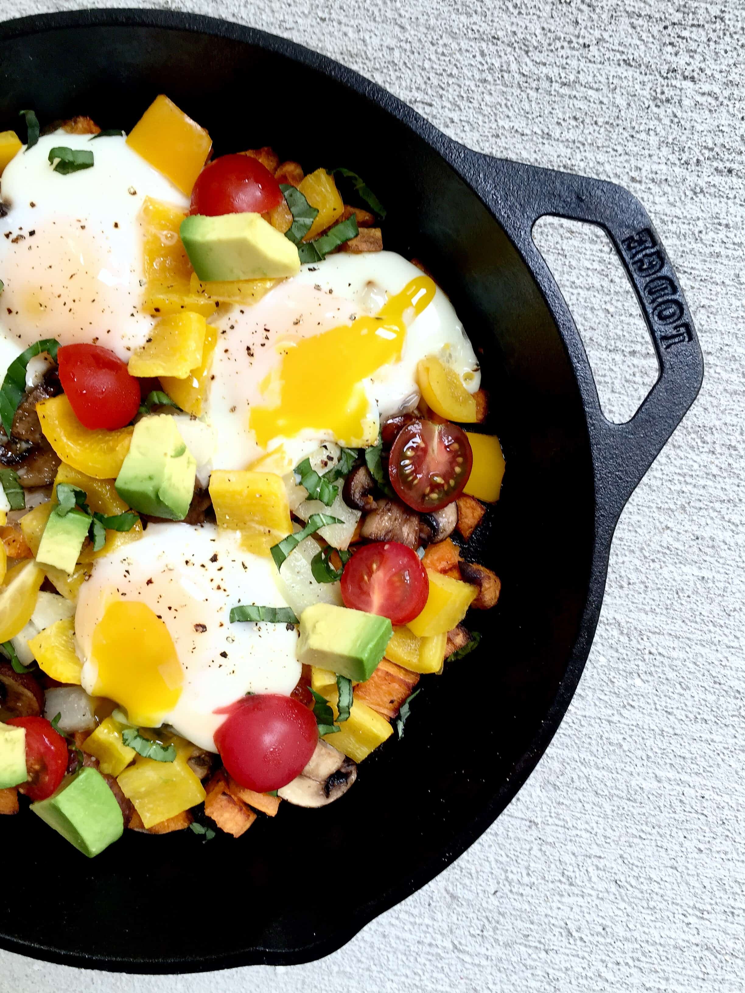 vegetables and eggs in a cast iron skillet