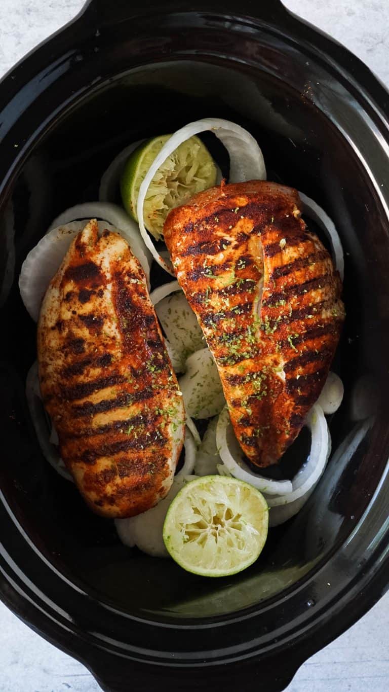 slow cooker chicken with onions and limes in a slow cooker