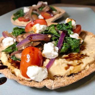 Pita pizza on a blue plate