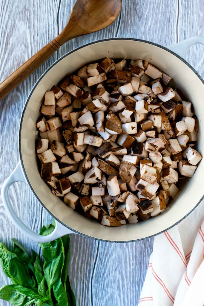 chopped mushrooms in a large pot