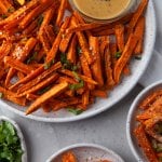 one large plate of sweet potato fries and two small plates