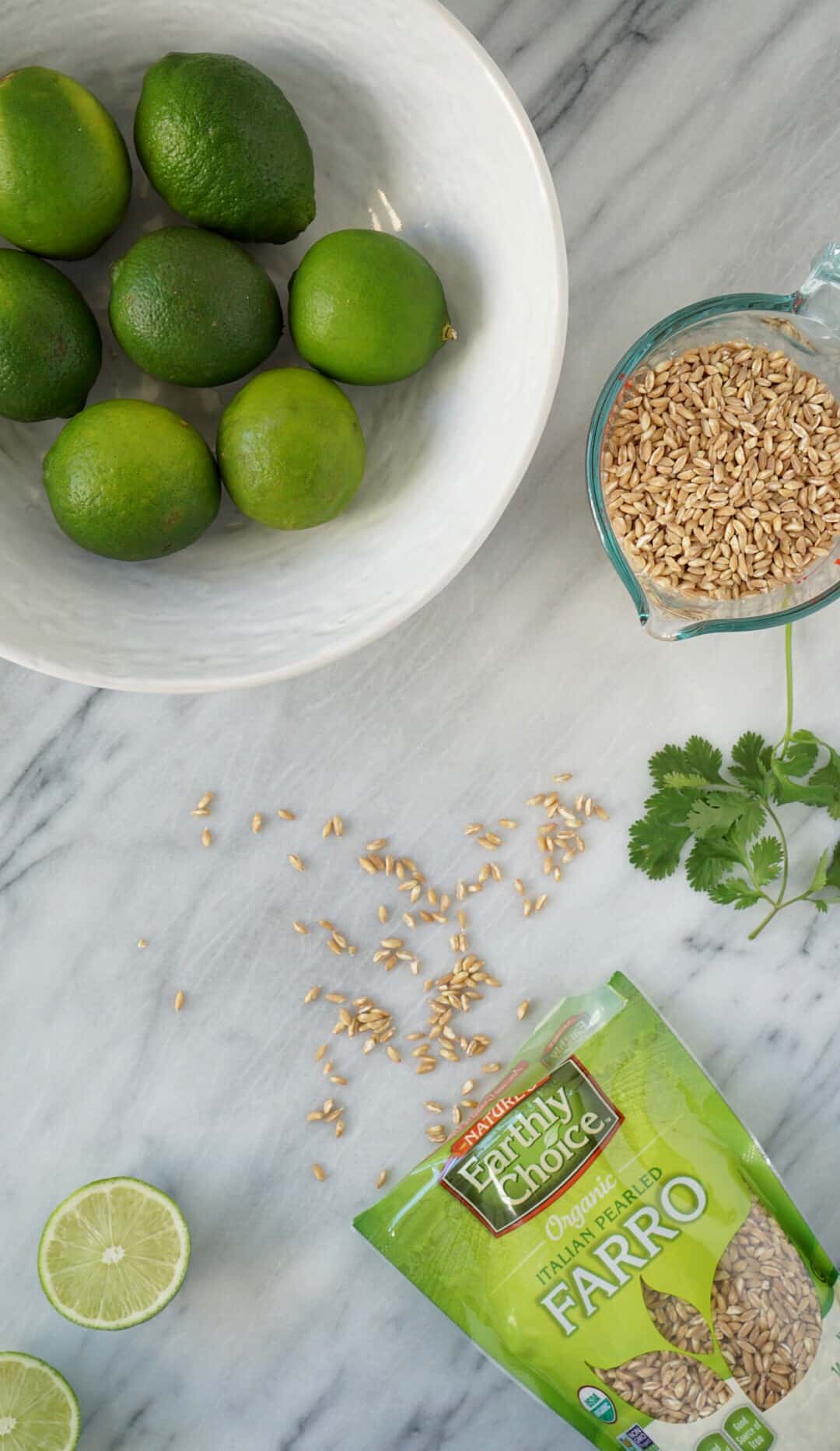 Cilantro lime farro ingredients on a marble slab