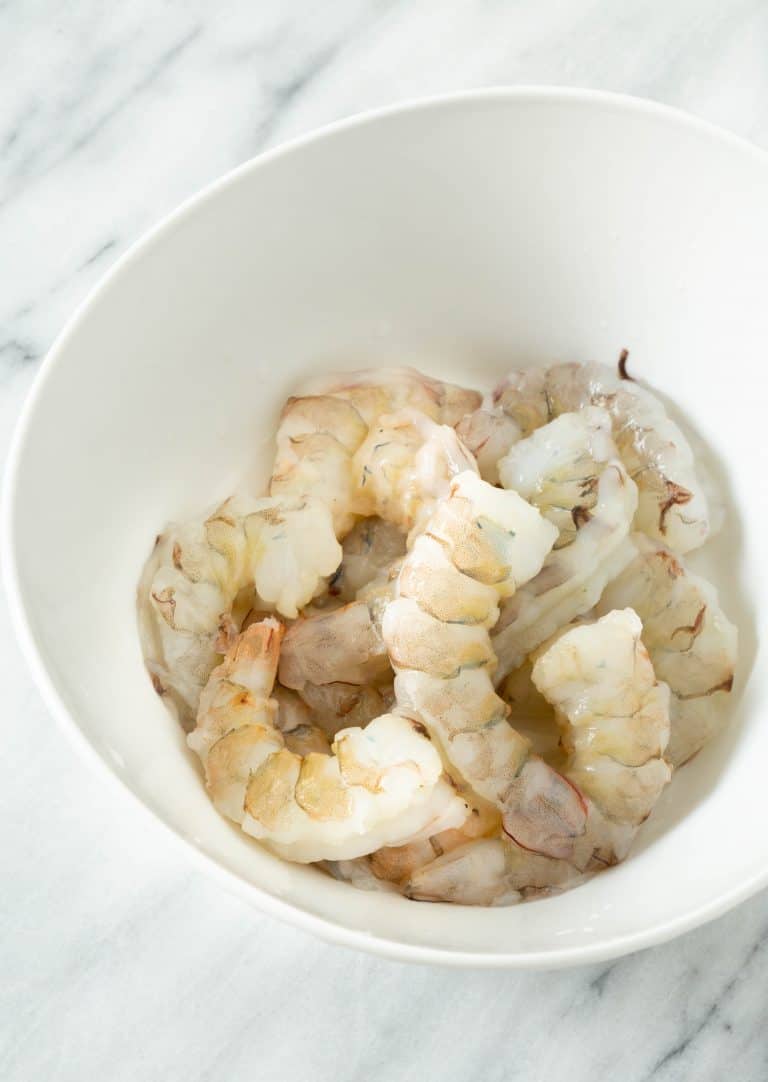 raw shrimp in a white bowl