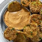 air fryer zucchini chip dipped in spicy mayo