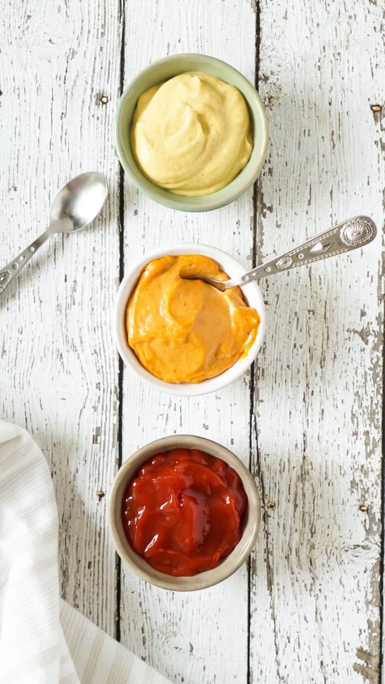 ketchup and mustard in small bowls