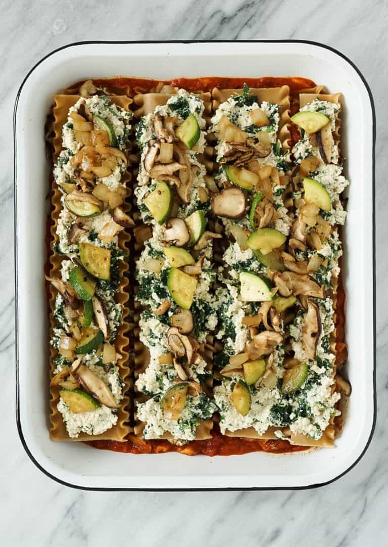 vegan lasagna in a white pan