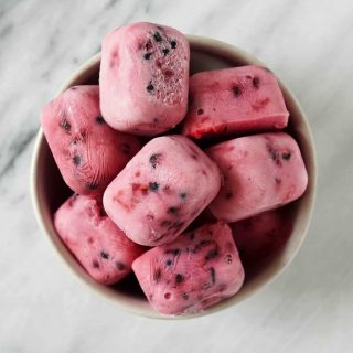 overhead shot of mixed berry yogurt bites in a bowl