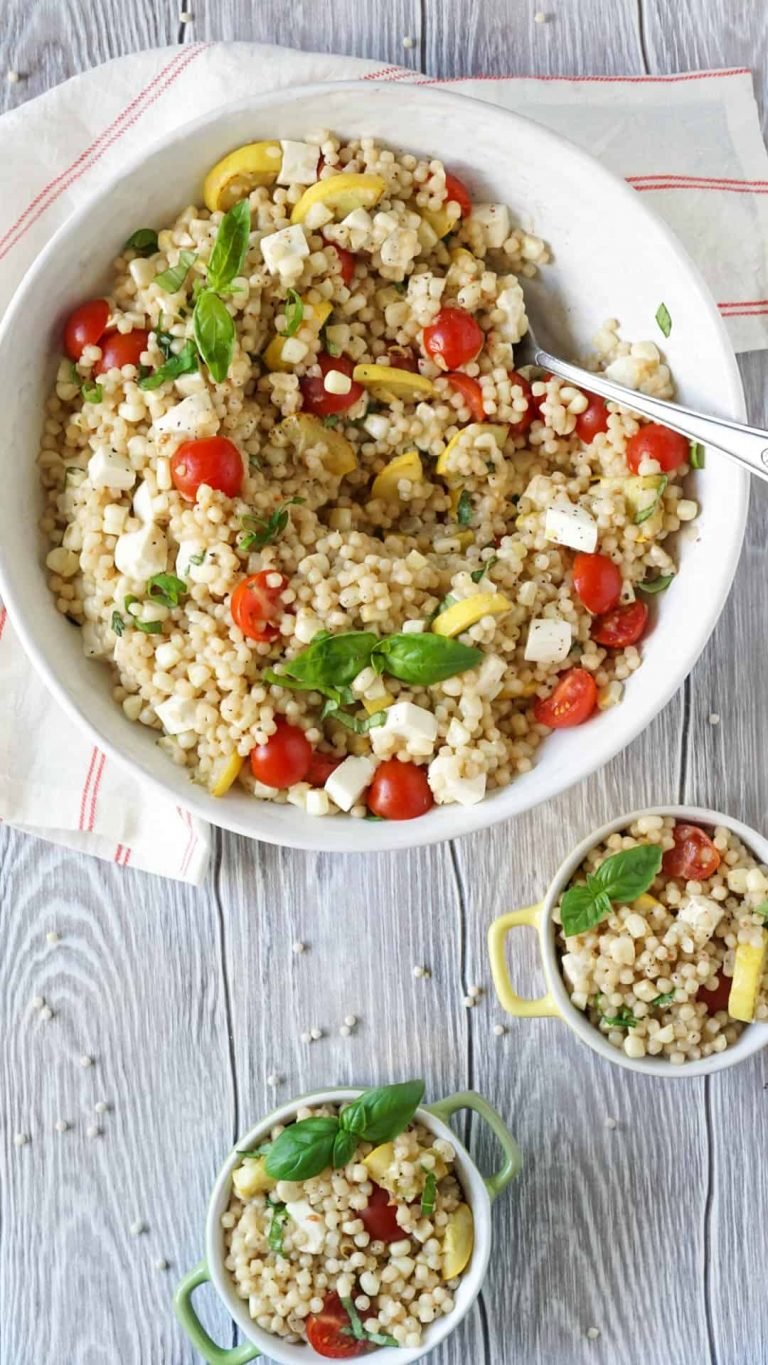 couscous salad in 2 small bowls and 1 large bowl