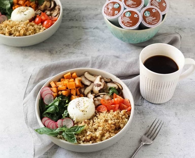 two quinoa breakfast bowls with a cup of coffee and k-cups in a blue bowl