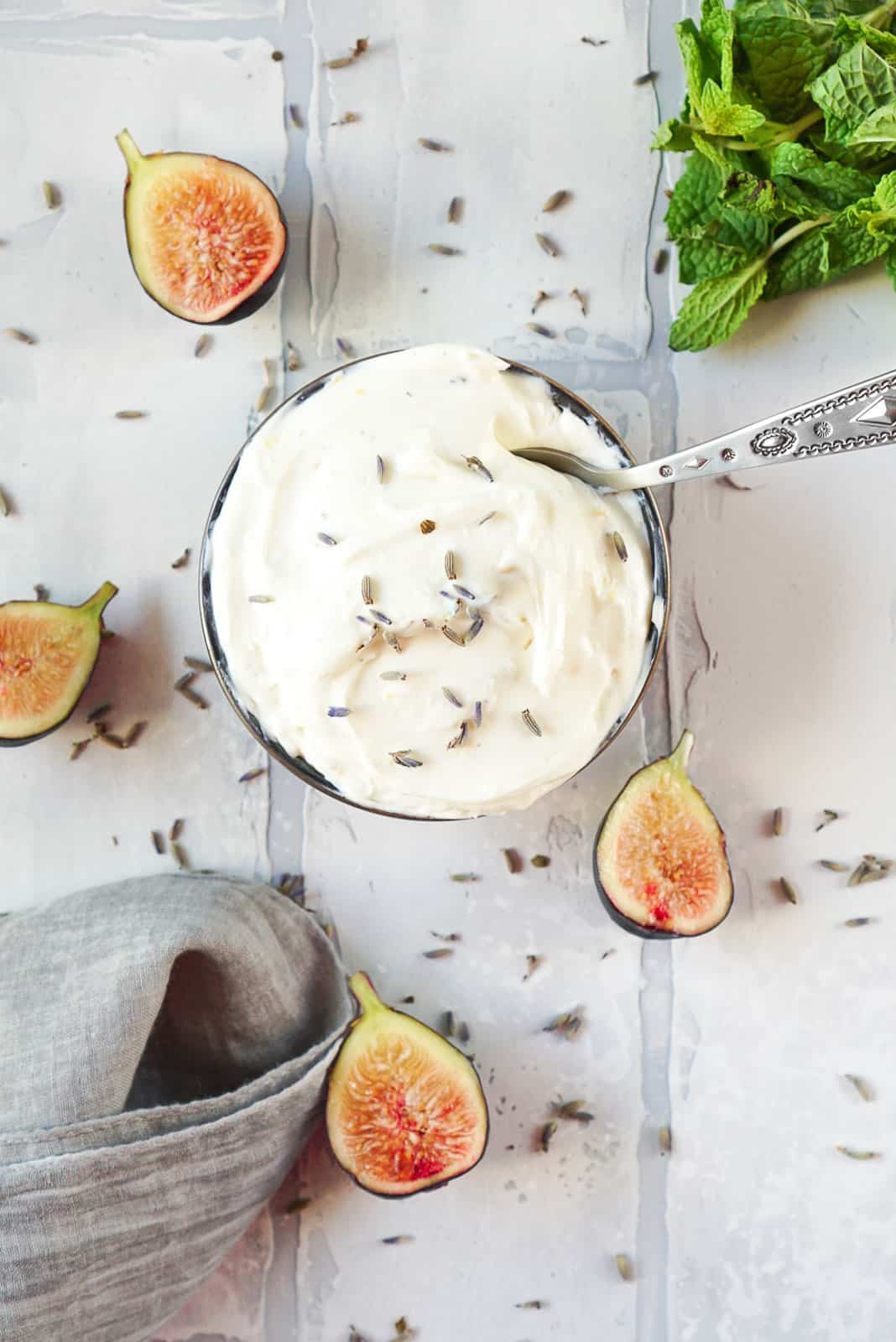 whipped goat cheese with fresh figs sliced in half and mint