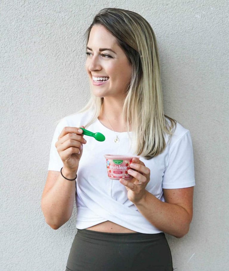 girl eating a kraft fruitlove smoothie cup