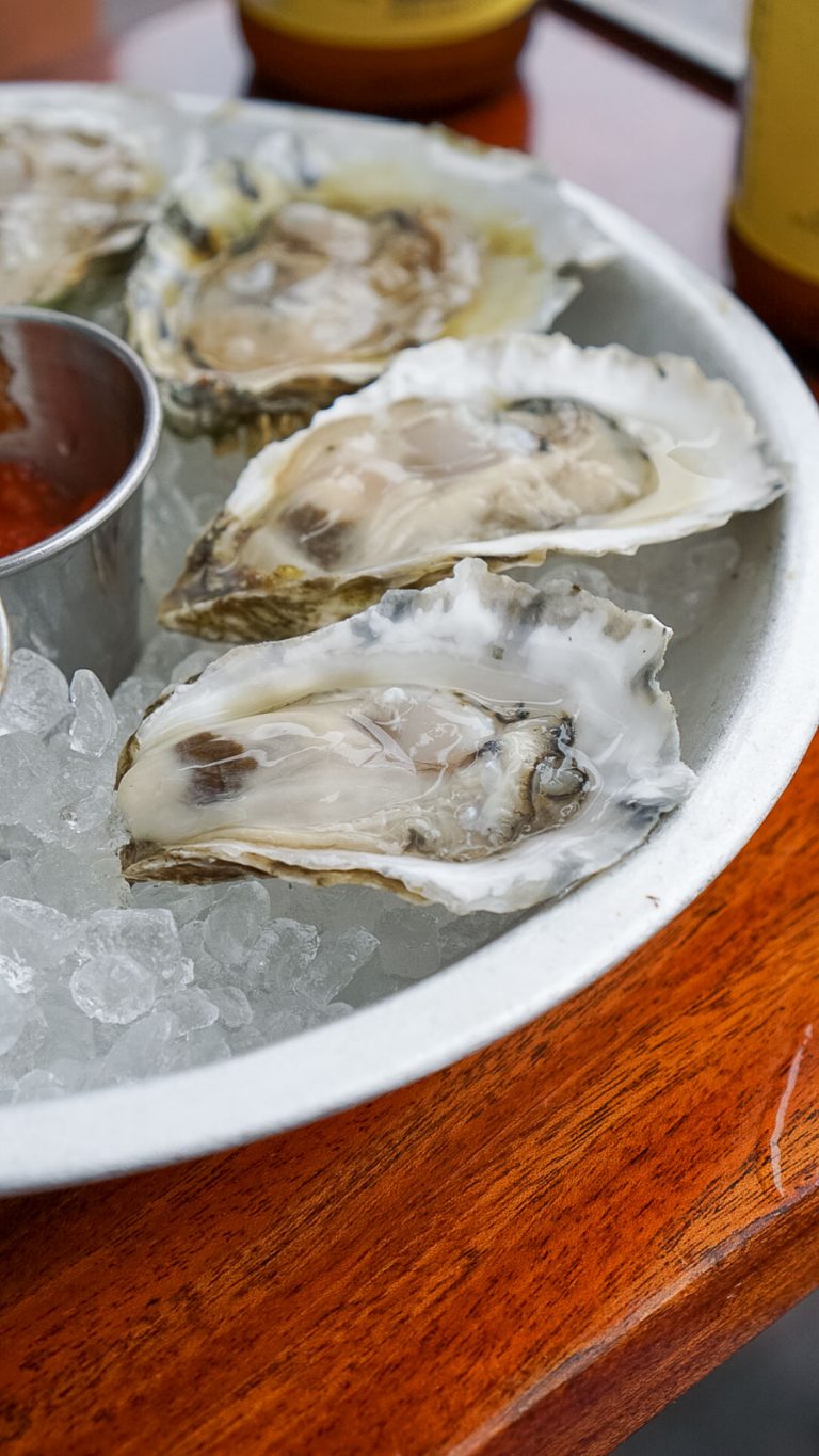 4 shucked oysters on ice from eventide 