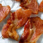 bacon strips on parchment paper