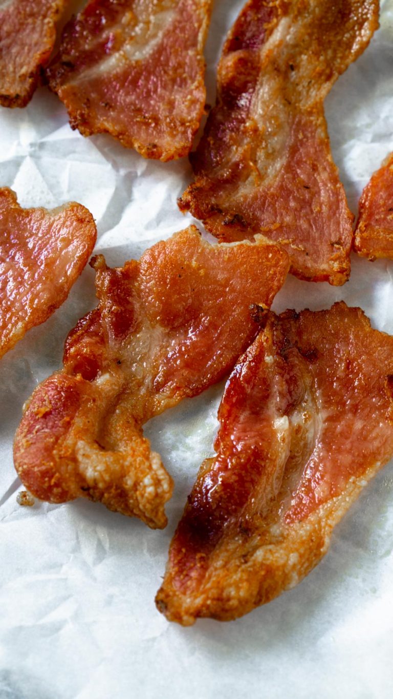 air fryer bacon on white parchment paper
