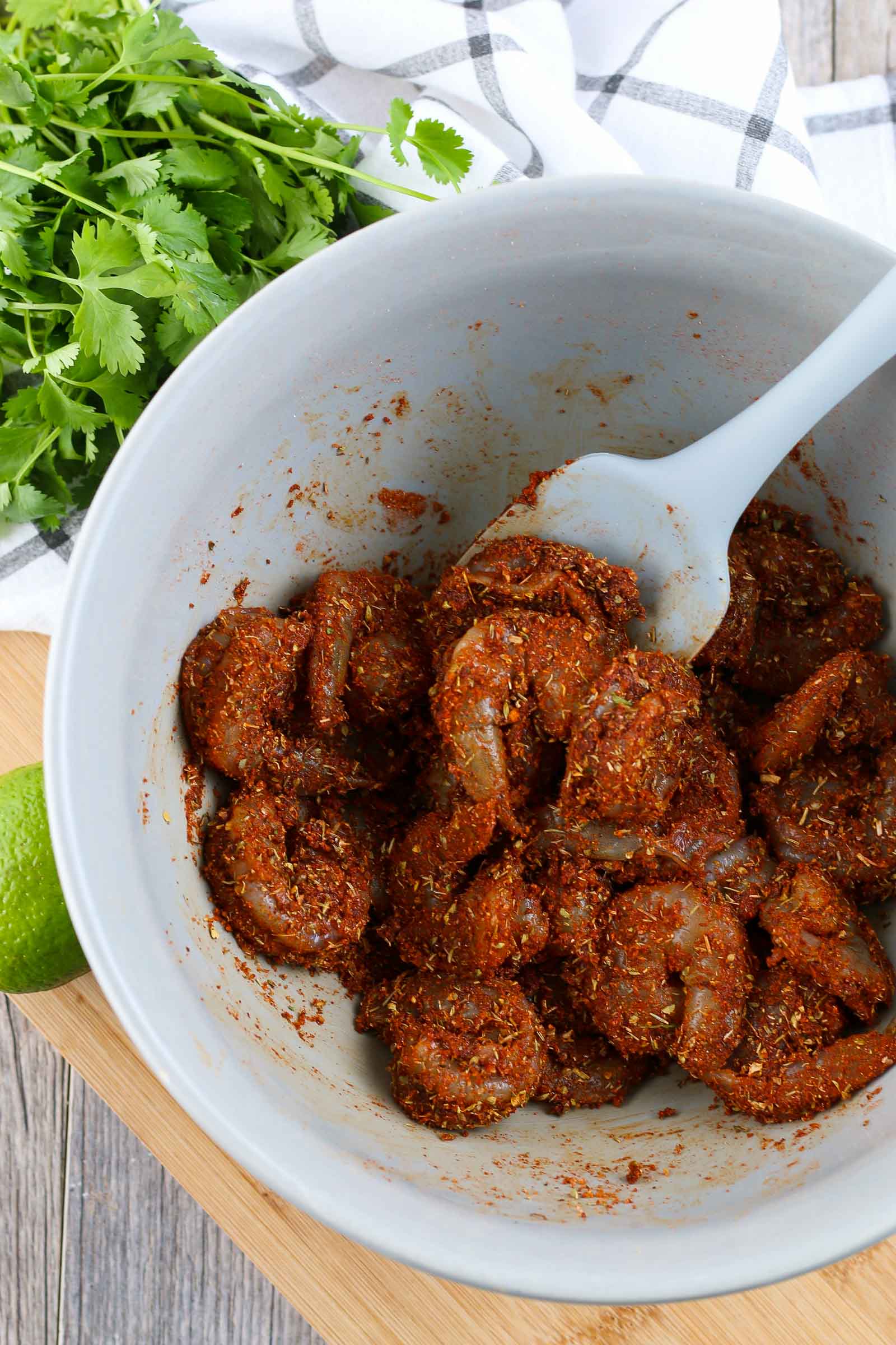 seasoned shrimp in a blue bowl