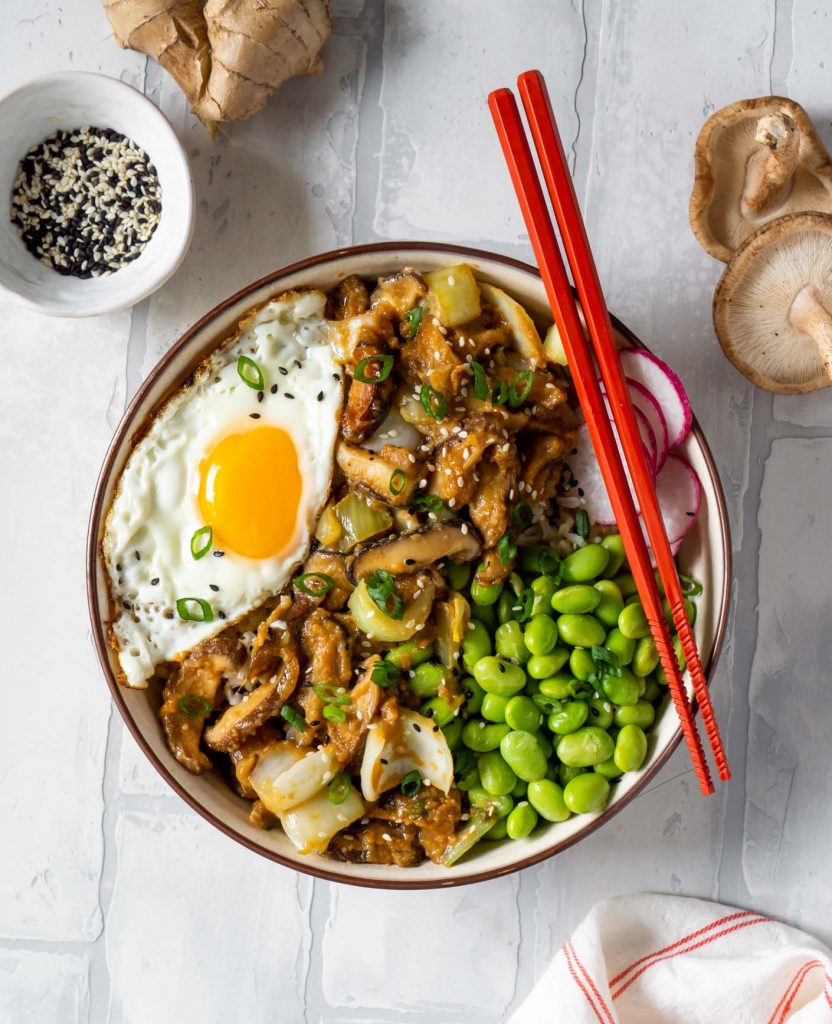 miso mushroom bowl with red chopsticks