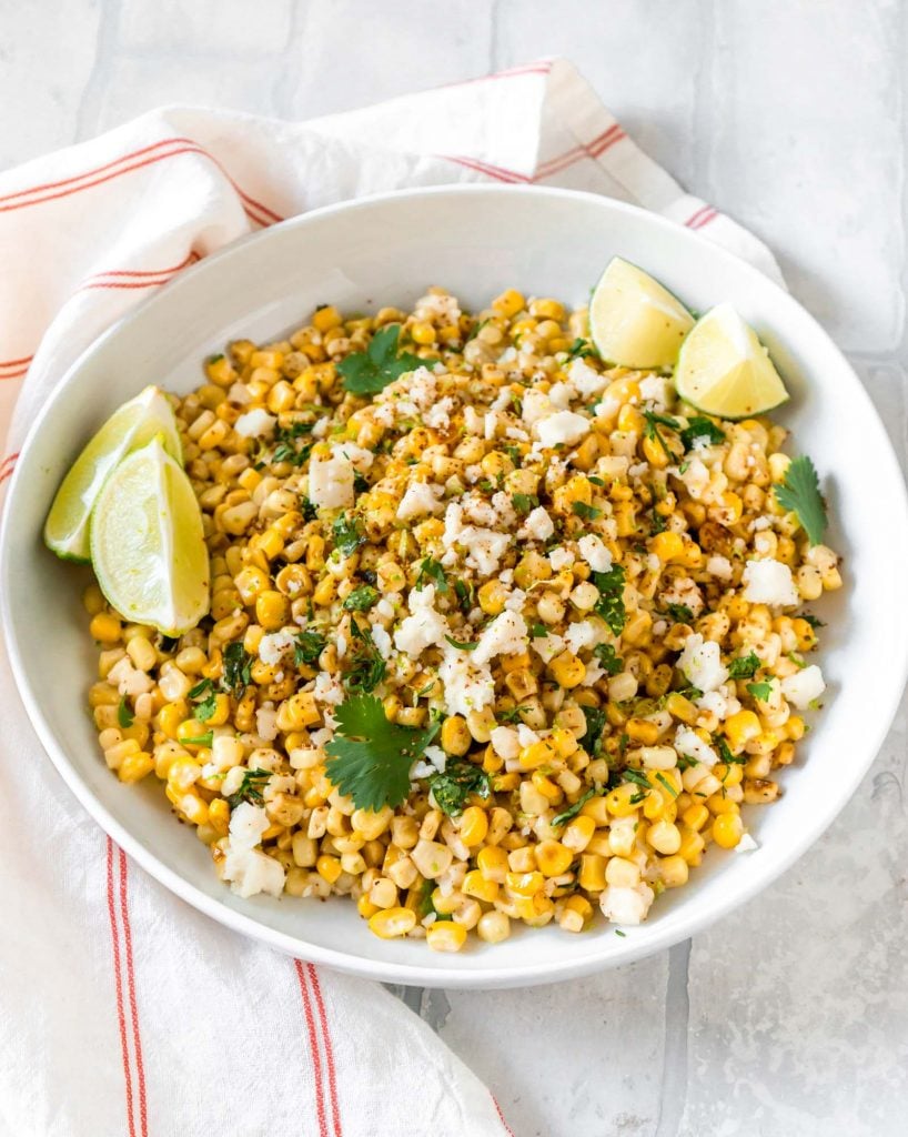mexican street corn dip in a large white bowl