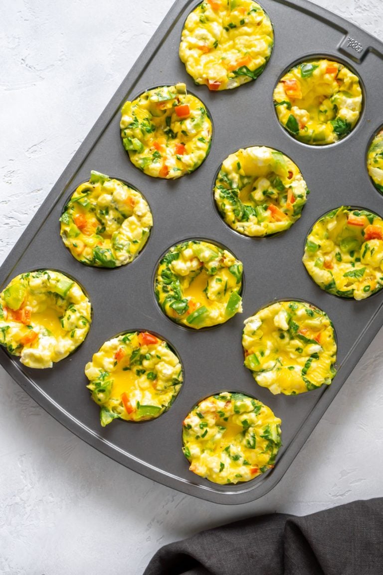 mini egg frittatas in a muffin tin