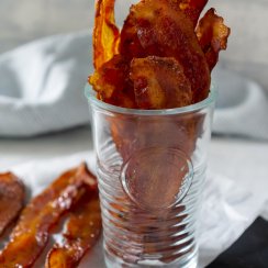 candied bacon in a glass