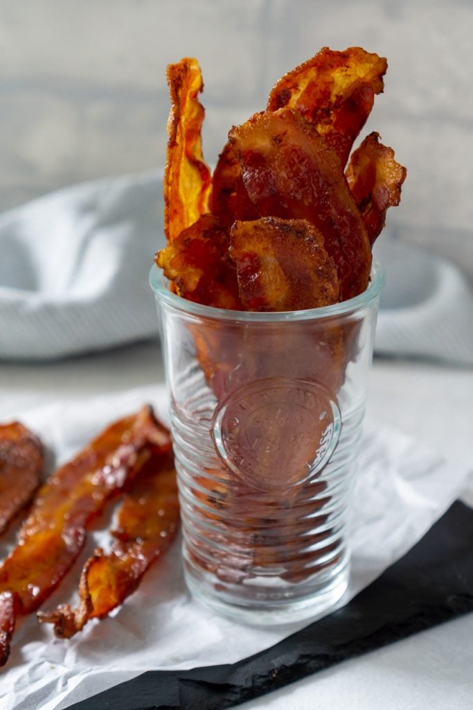 candied bacon in a glass