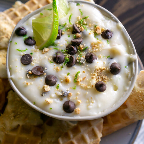 overhead photo of cannoli dip with a lime wedge on top