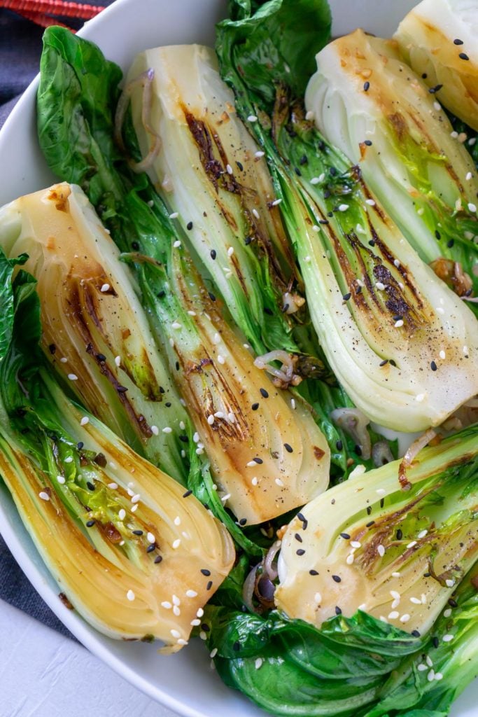 cooked bok choy in a white bowl