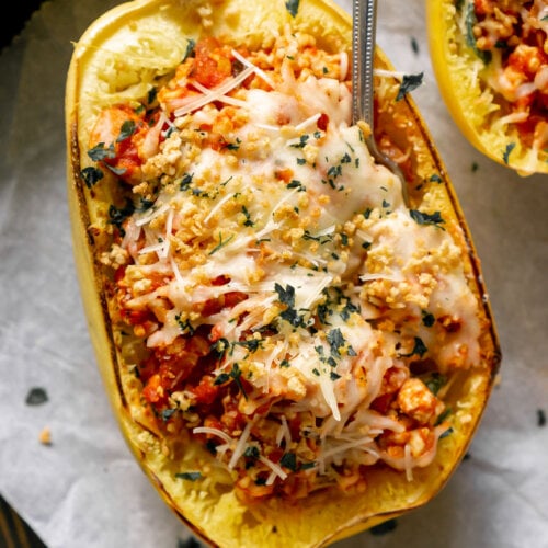 spaghetti squash lasagna boat with a fork