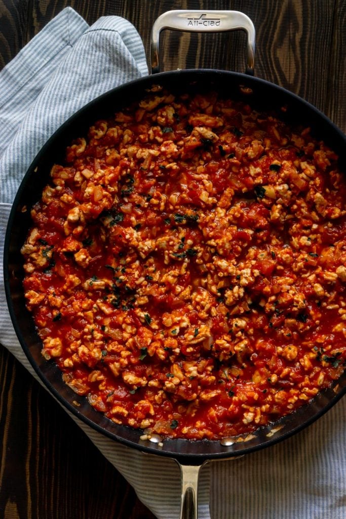ground turkey and marinara sauce in a large pan