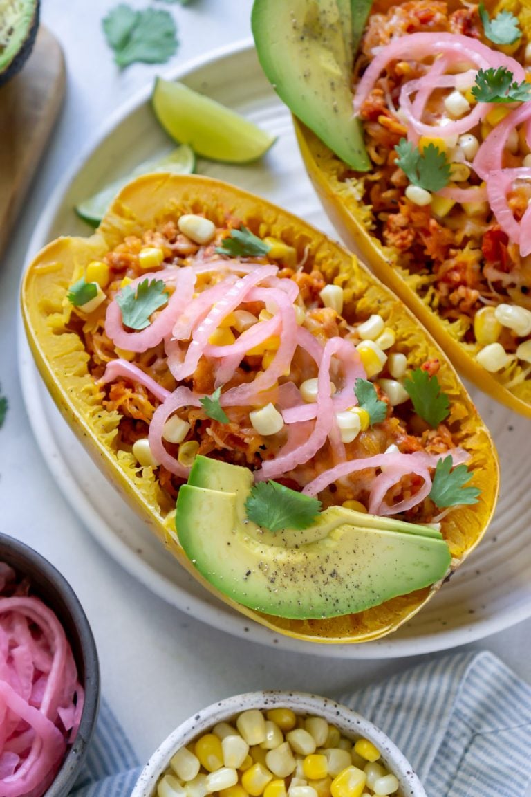 taco spaghetti squash boats on a white plate