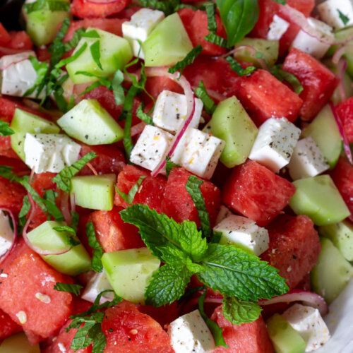 watermelon feta salad in a large white bowl