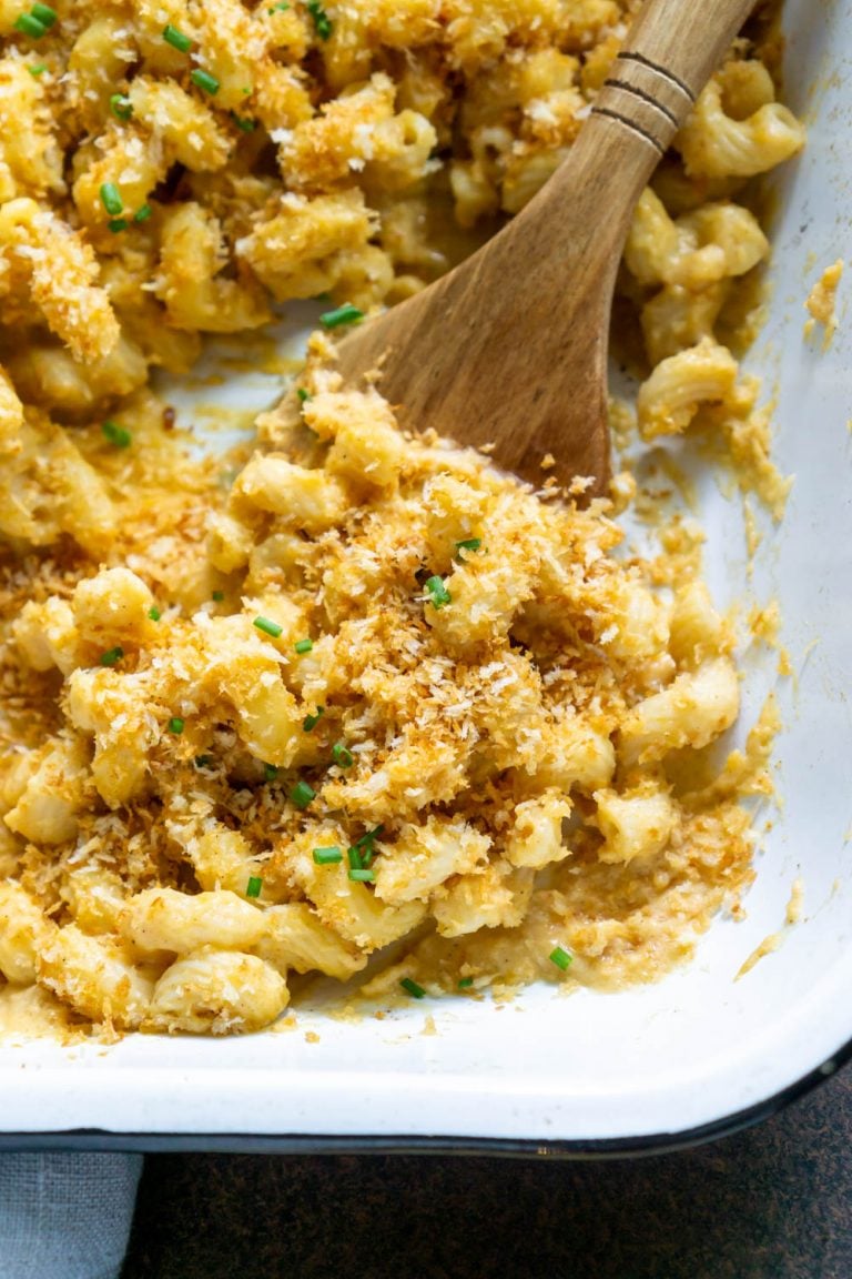 butternut squash mac and cheese on a wood spoon