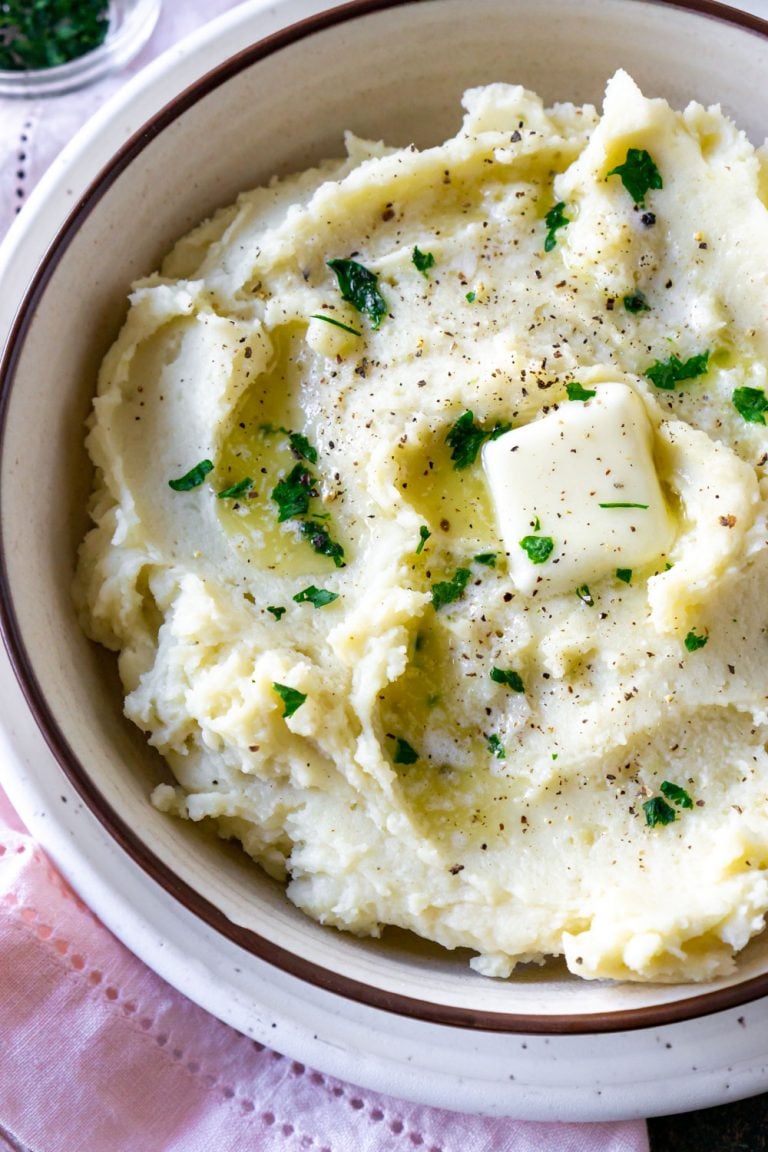 garlic mashed potatoes in a white bowl