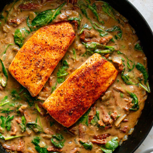 tuscan salmon in a cast iron pan