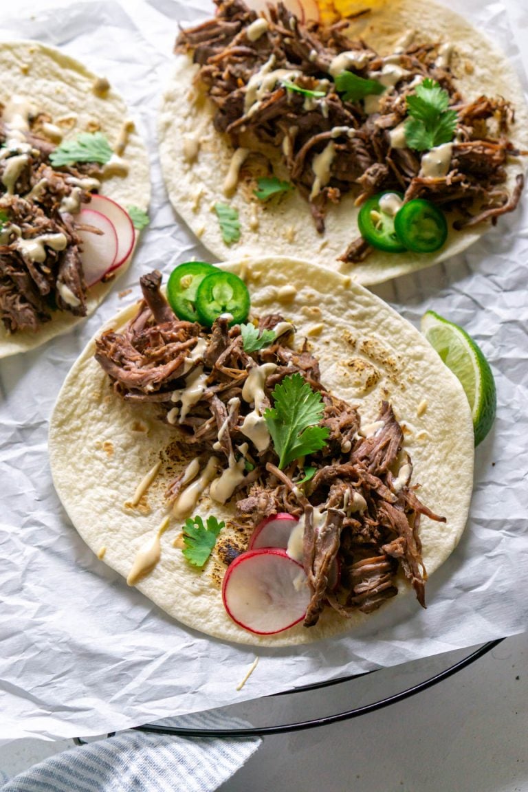 three barbacoa tacoas