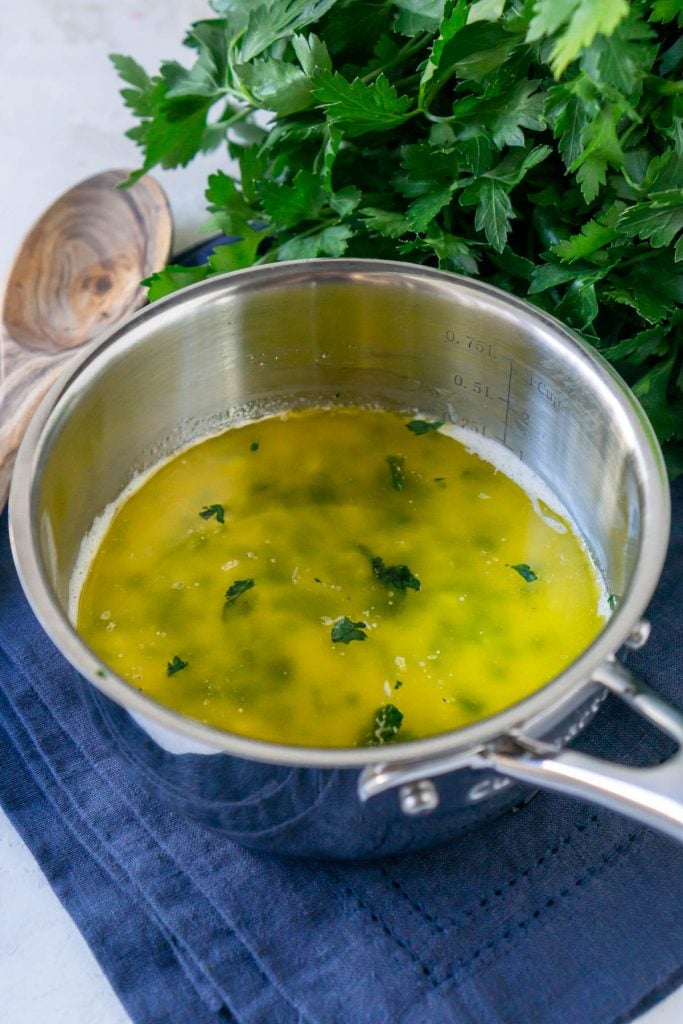garlic butter sauce in a pan with parsley