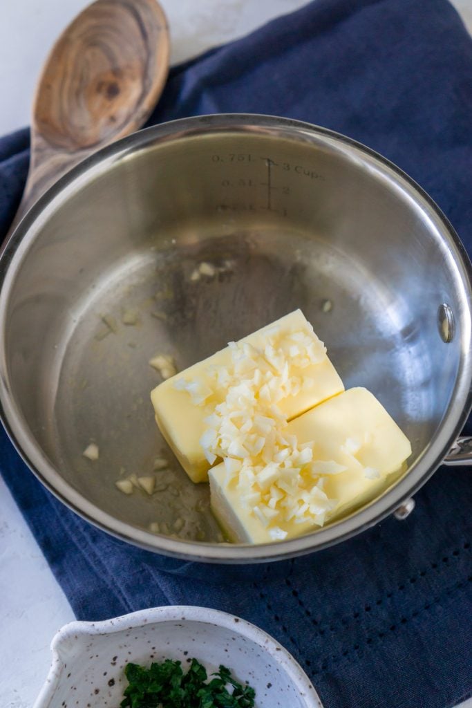 butter in a sauce pan with garlic