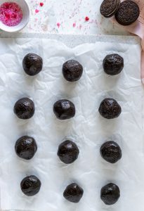oreo balls on parchment paper