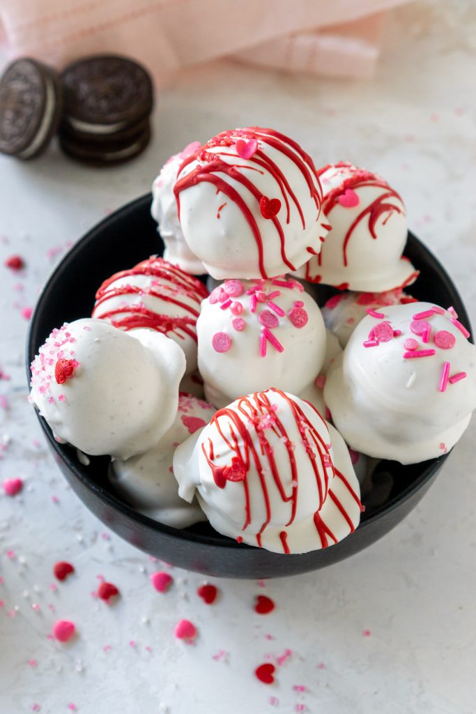 oreo truffles in a bowl with valentines sprinkles