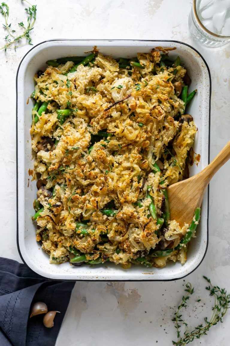 healthy green bean casserole in a white baking dish