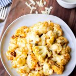 air fryer cauliflower with cheese on a plate