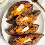 sweet potatoes with butter on a white plate