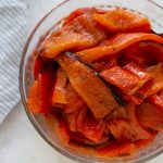 roasted red peppers in a glass bowl