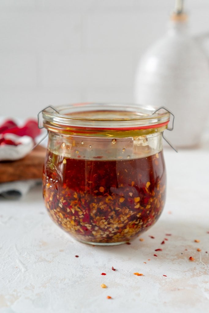 chili garlic sauce in a glass jar with lid