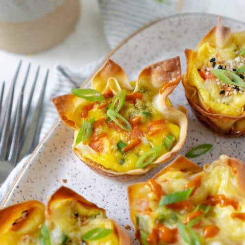 egg bites on a plate with a fork