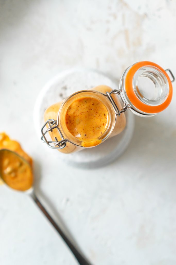 overhead photo of big mac sauce in a jar and sauce on a spoon