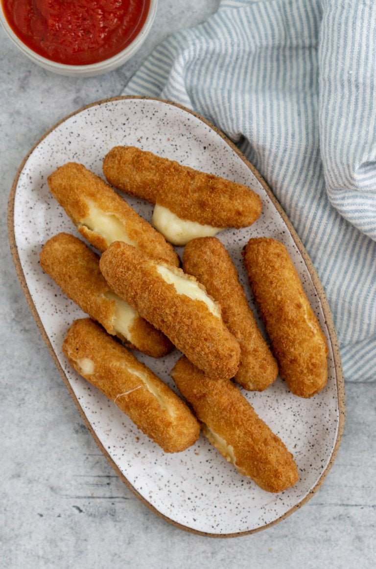 air fryer frozen mozzarella sticks on a plate