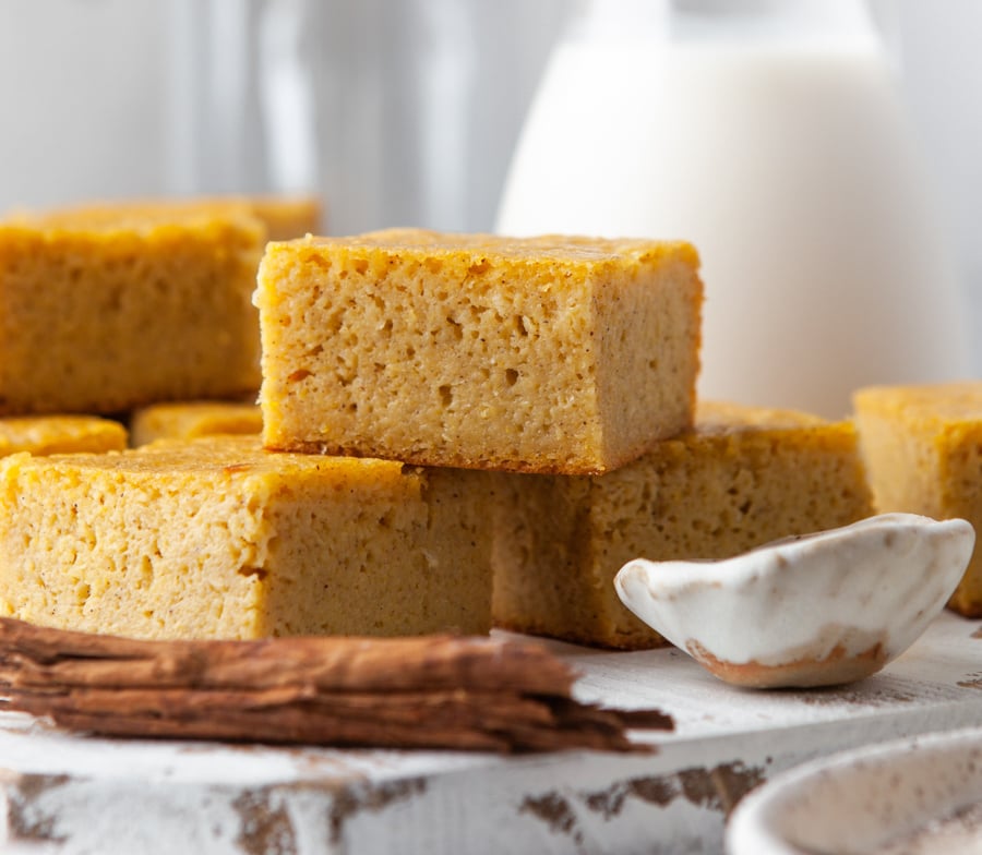 golden sweet cornbread squares with milk on the side