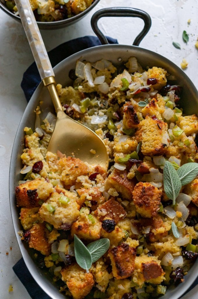 stuffing in a pan with some scooped out