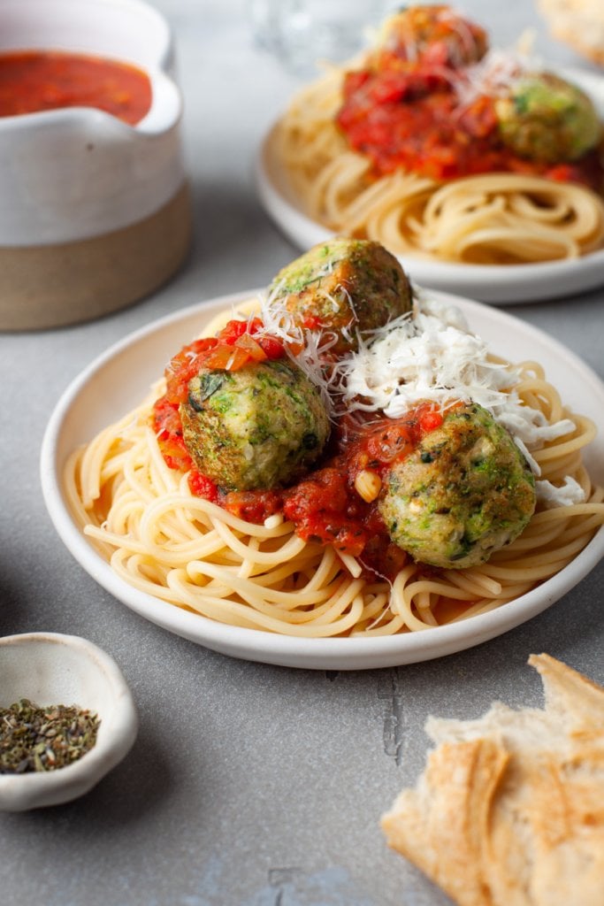 zucchini meatballs with marinara sauce over spaghetti