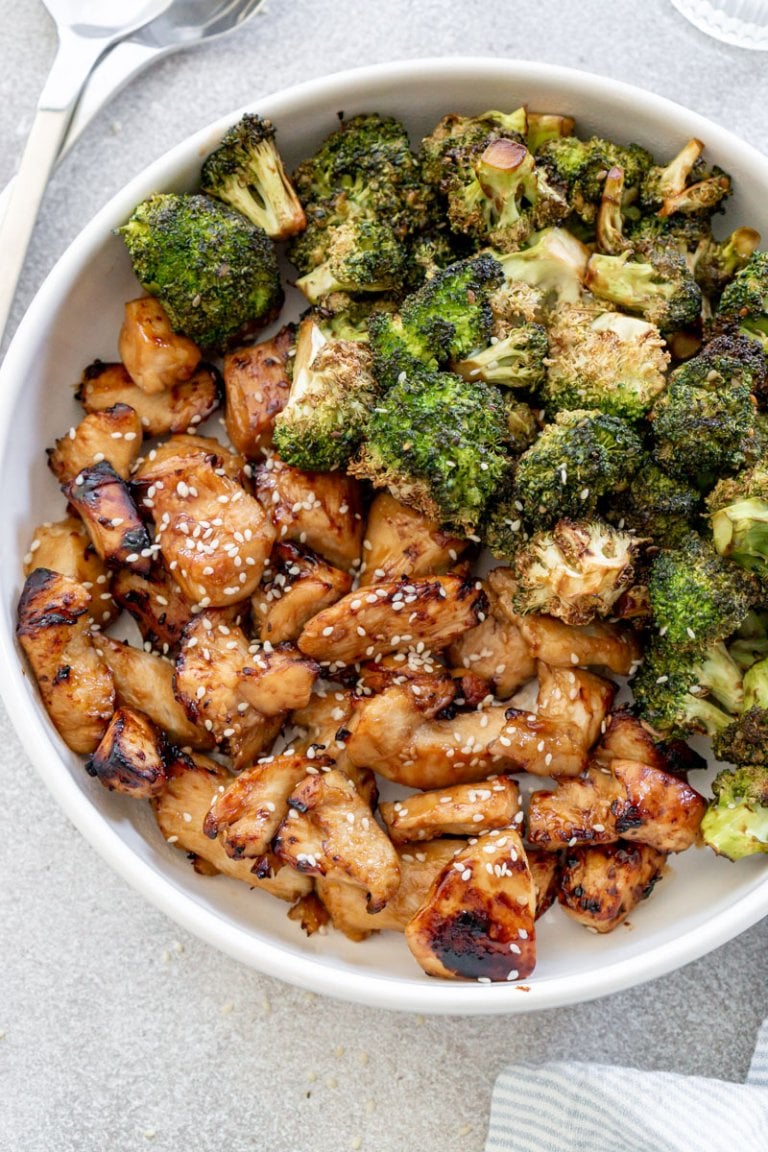 air fryer chicken and broccoli in a white serving bowl